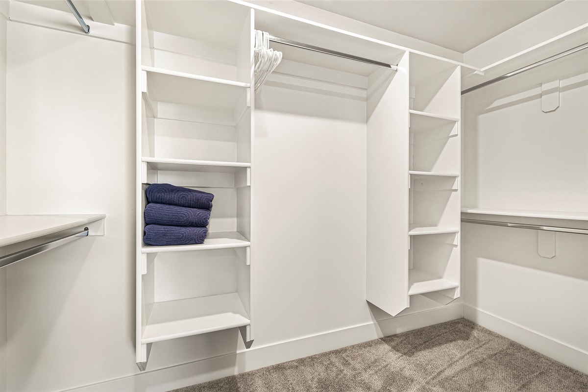 Master bedroom walk-in closet with tons of space and storage.