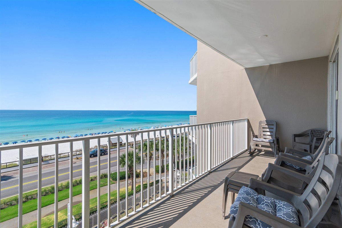 Stunning views from this 4th Floor, Corner-Unit Condo! The perfect place to enjoy your morning coffee or a cold afternoon beverage.