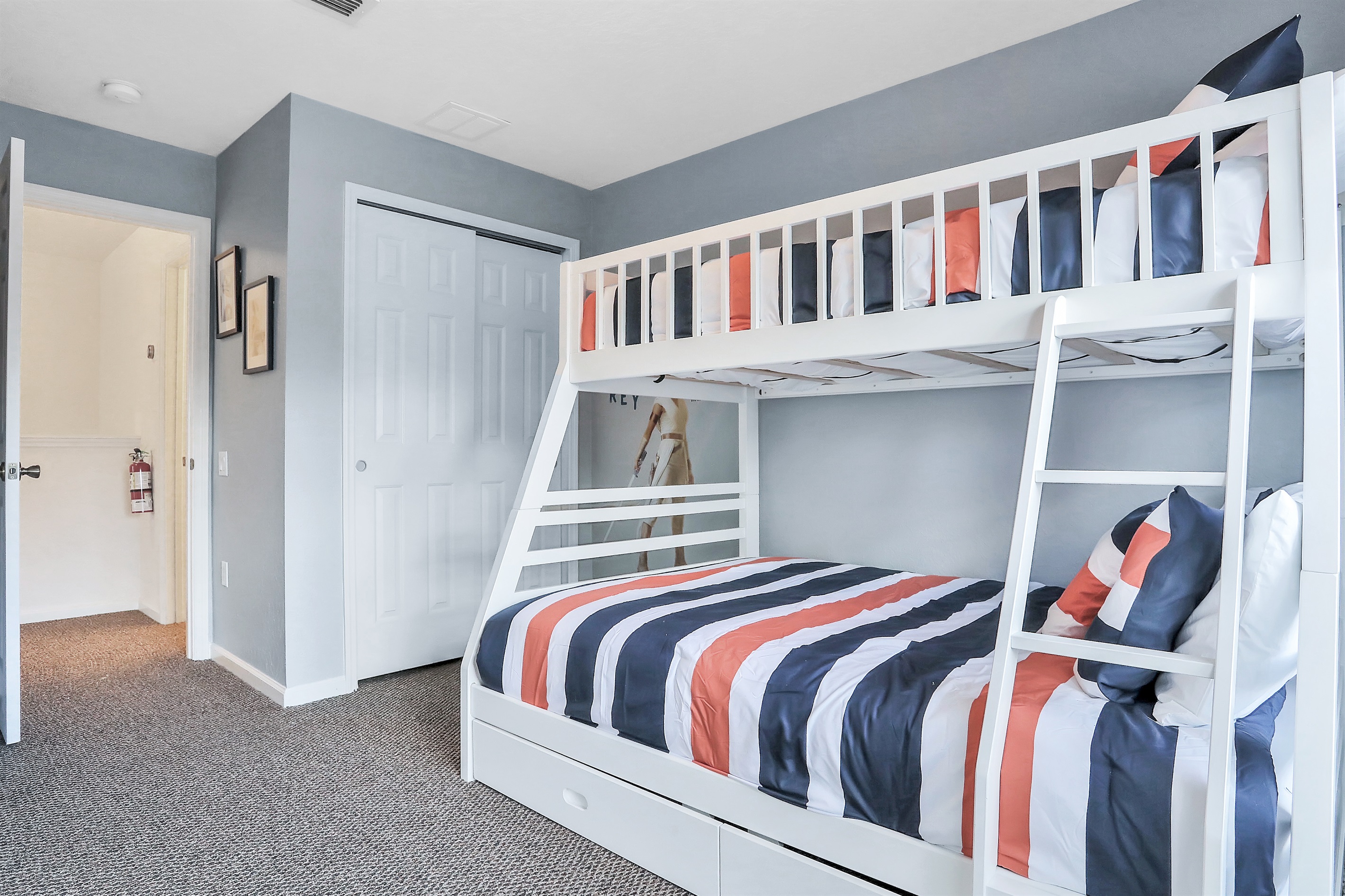 Star Wars bunkroom for the kids, with a trundle and 43" Smart TV. Now with luxury vinyl flooring.