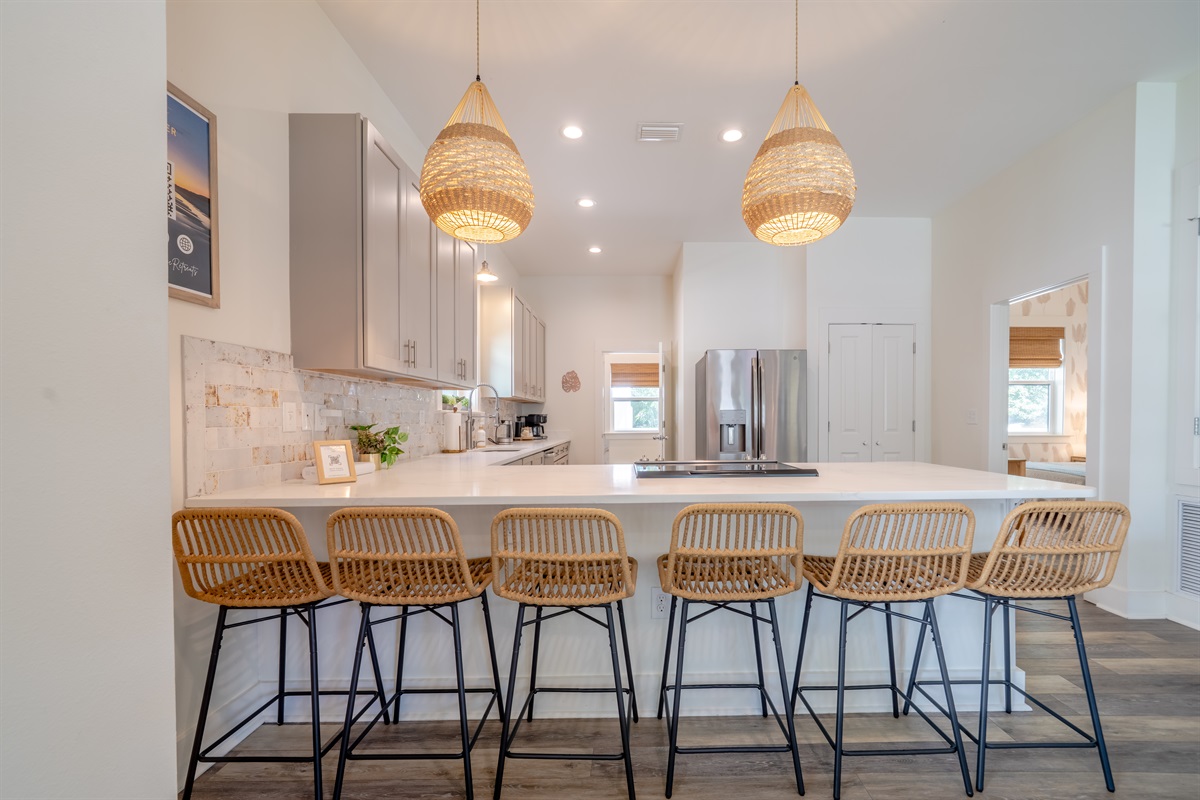 Kitchen island with seating for six—great for casual meals and gathering with family or friends
