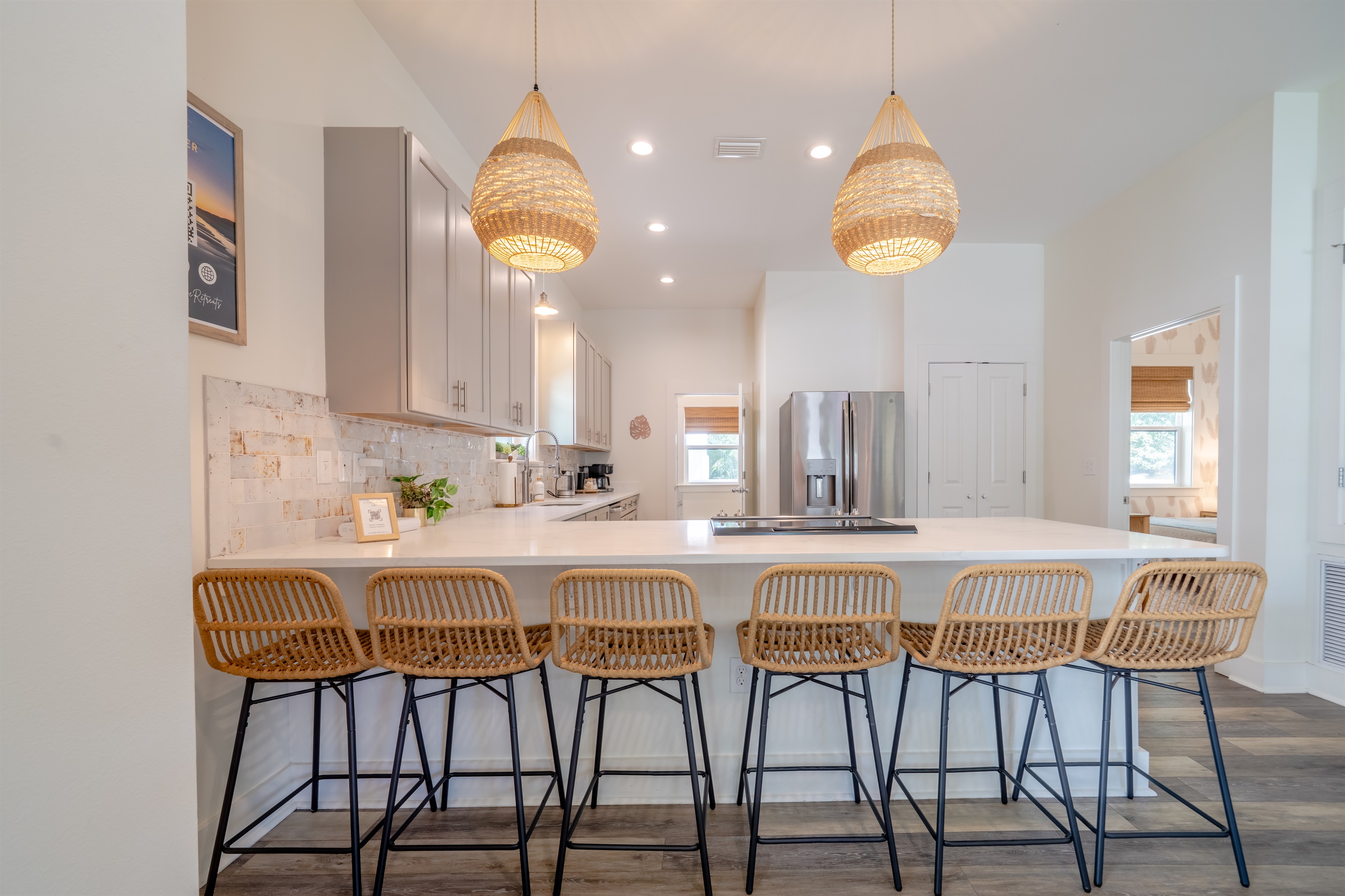 Kitchen island with seating for six—great for casual meals and gathering with family or friends
