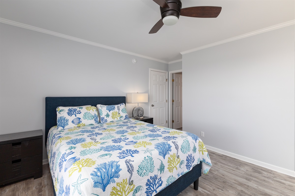 The room's decor is cozy and well-designed