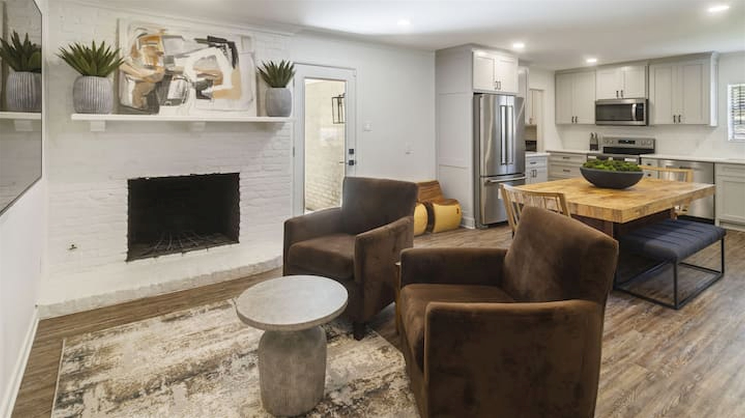 Open living and dining area with comfortable seating and an easy flow between spaces.