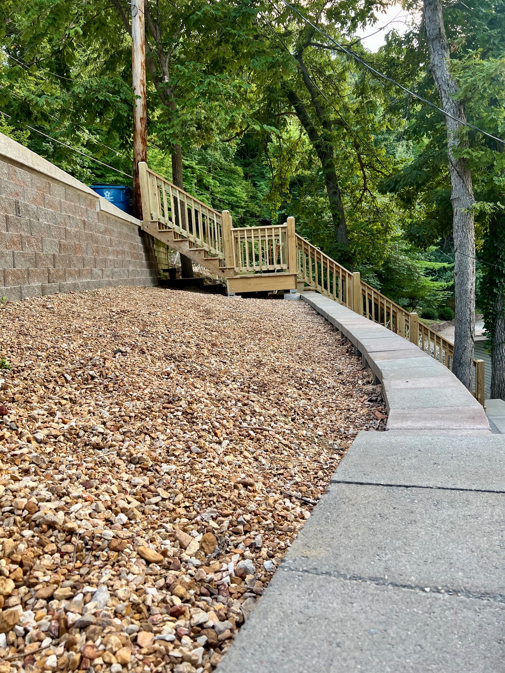 Brand new staircase leads from street-level parking to the front door