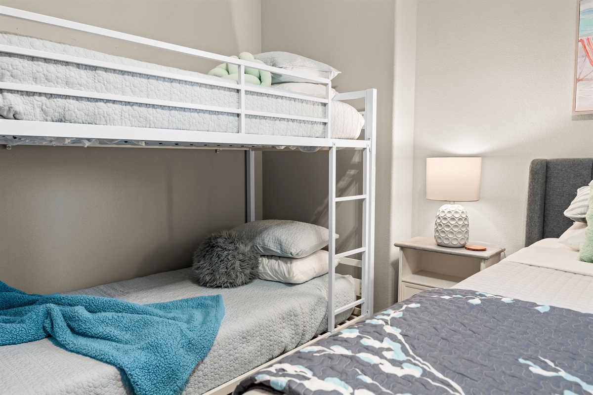 Lower level bedroom with twin bunk bed and a queen bed with Jack  & Jill bath 