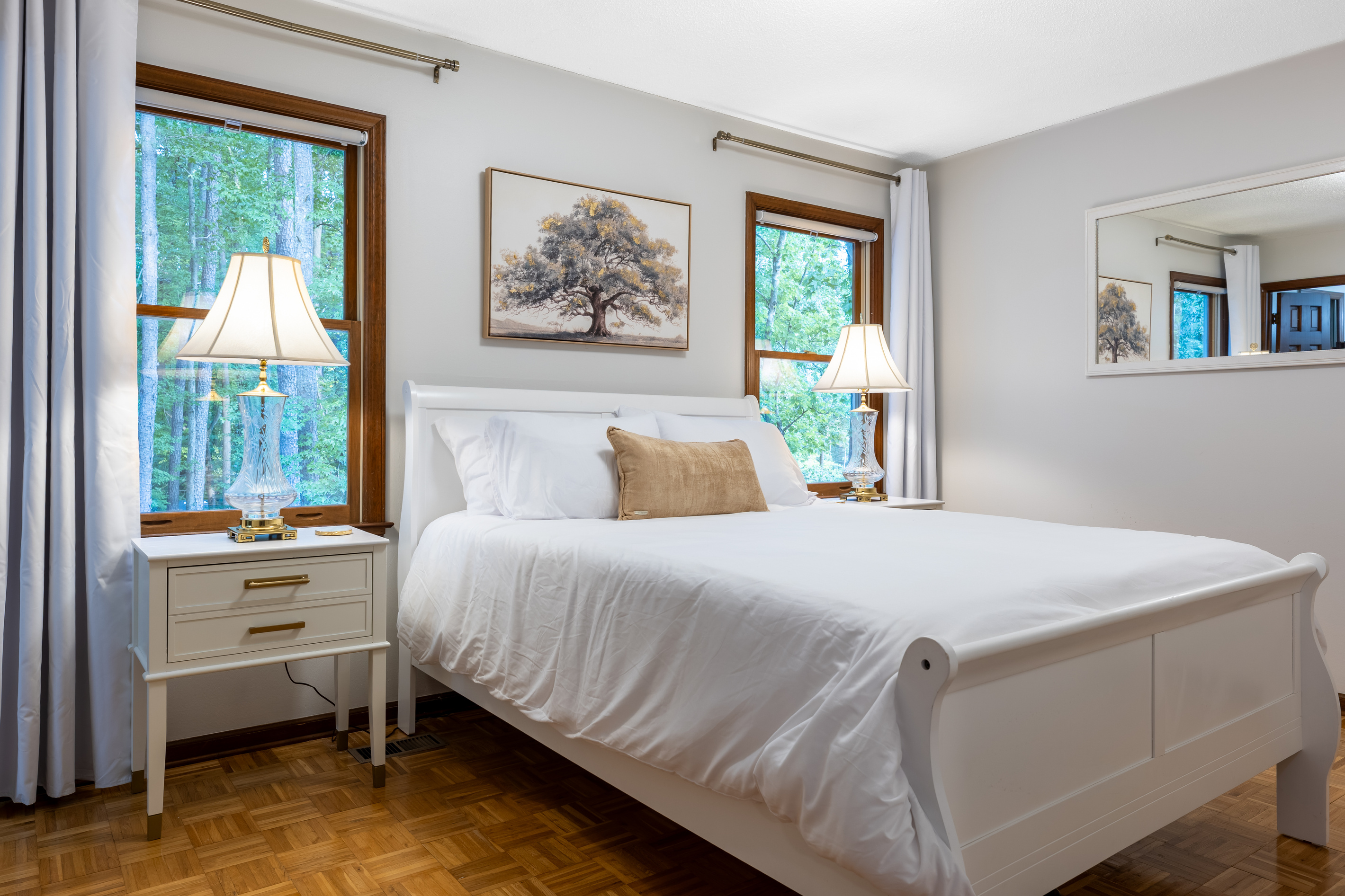 The upstairs master bedroom offers a queen bed with an on suite bathroom.