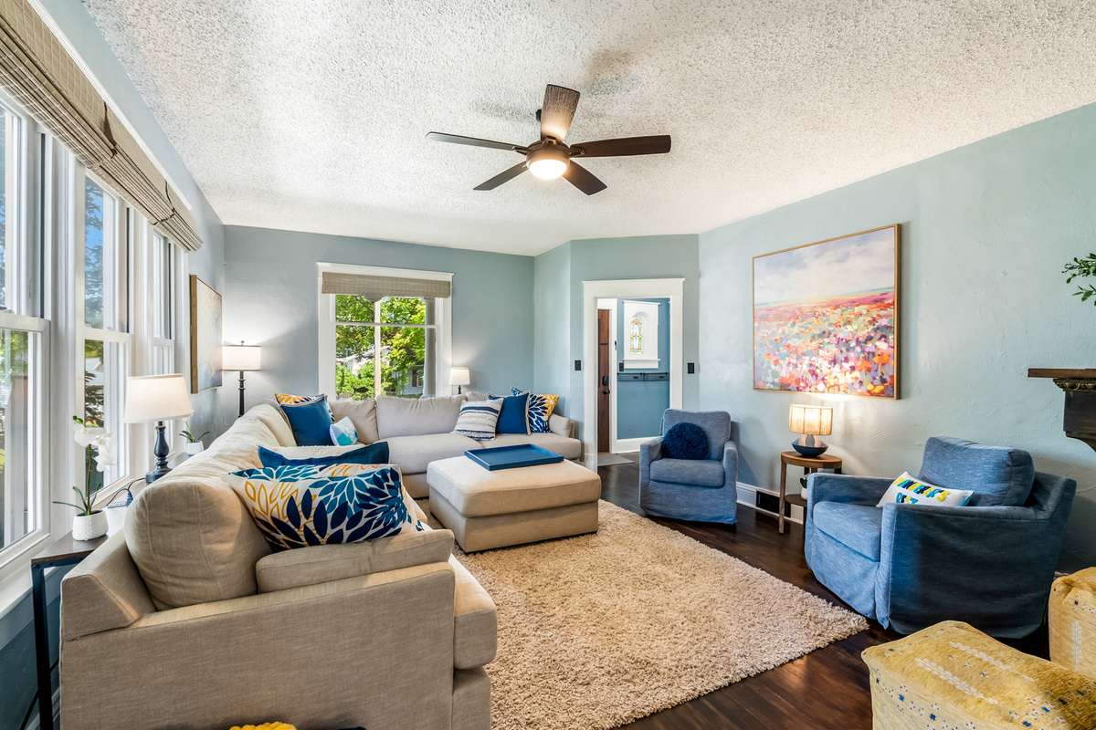 Designed with big groups in mind. The main floor features an expansive, deep sectional couch that lets everyone gather comfortably in one bright, open communal space.