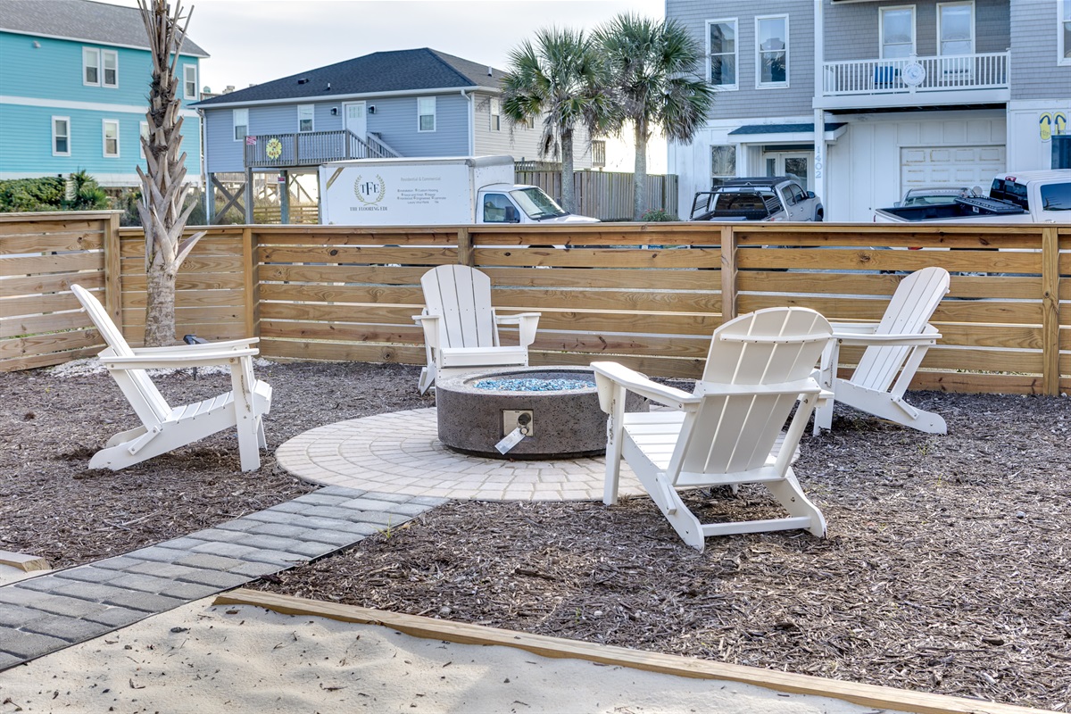 Enclosed for privacy and designed for gathering, the fire pit lounge is a guest favorite year-round