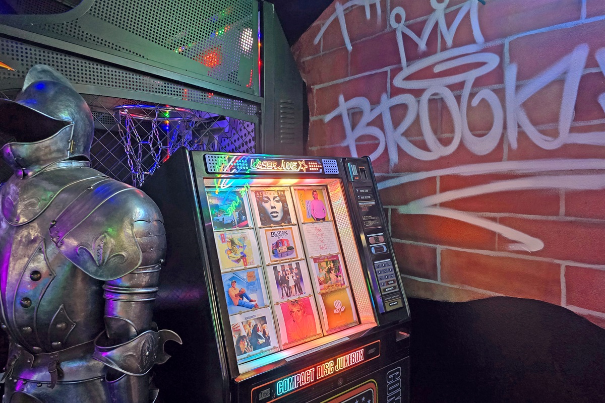 Play your favorite songs on the jukebox operated with Alexa. Just say, "Alexa, play country music" or "Alexa, play the Beatles."