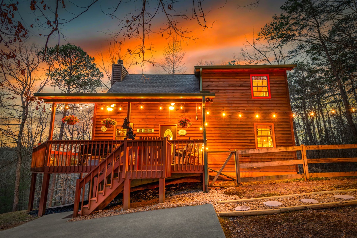 The combination of indoor and outdoor lighting adds depth and elegance to the space.