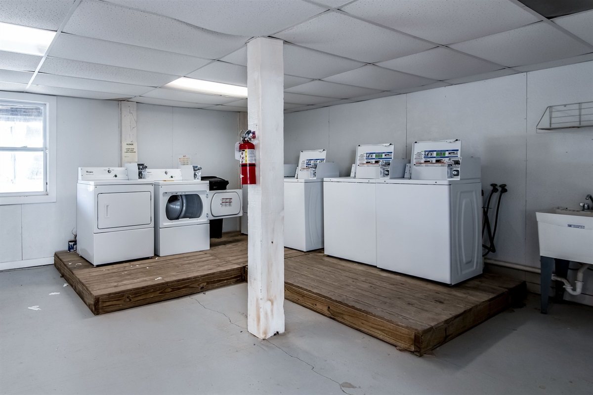On site coin laundry room - An on site laundry room is provided for your convenience. Bring some coins with you as these machines are only powered by quarters. A utility sink is also offered for those swimming trunks that are filled with sand and those bat