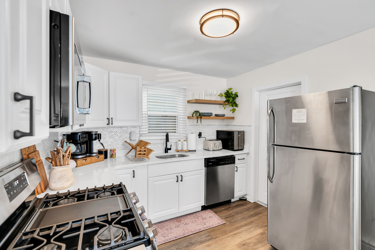 Cook a real meal or just brew the morning coffee before the beach. You get a full gas range, granite counters, and everything stocked and ready when you arrive.