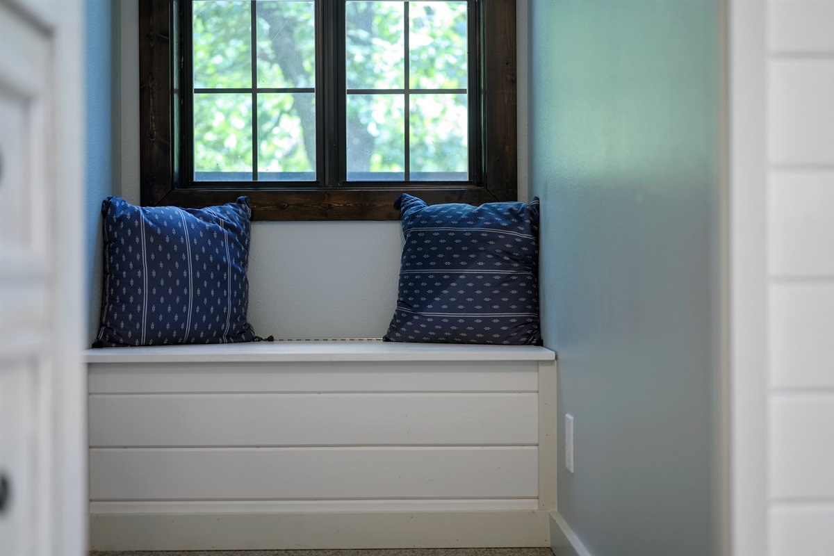Window seat with beautiful view of the property.