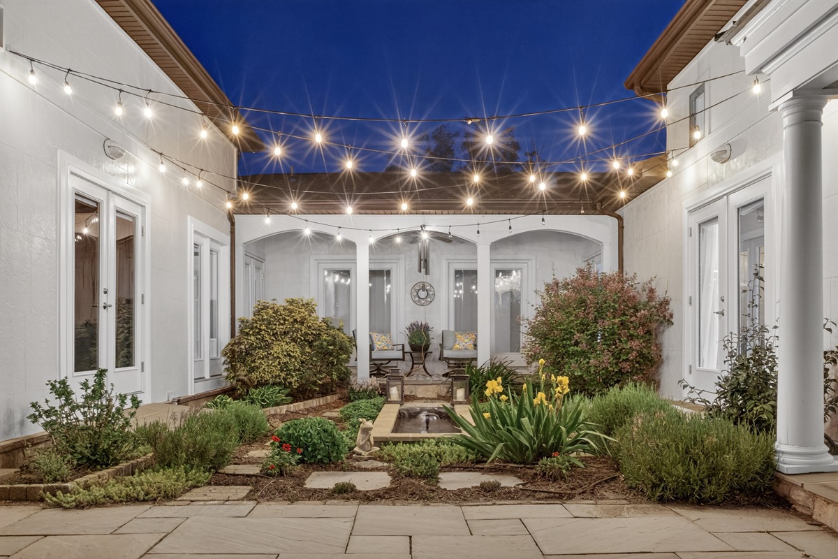 The heart of the home-a peaceful courtyard with fountains and lights
