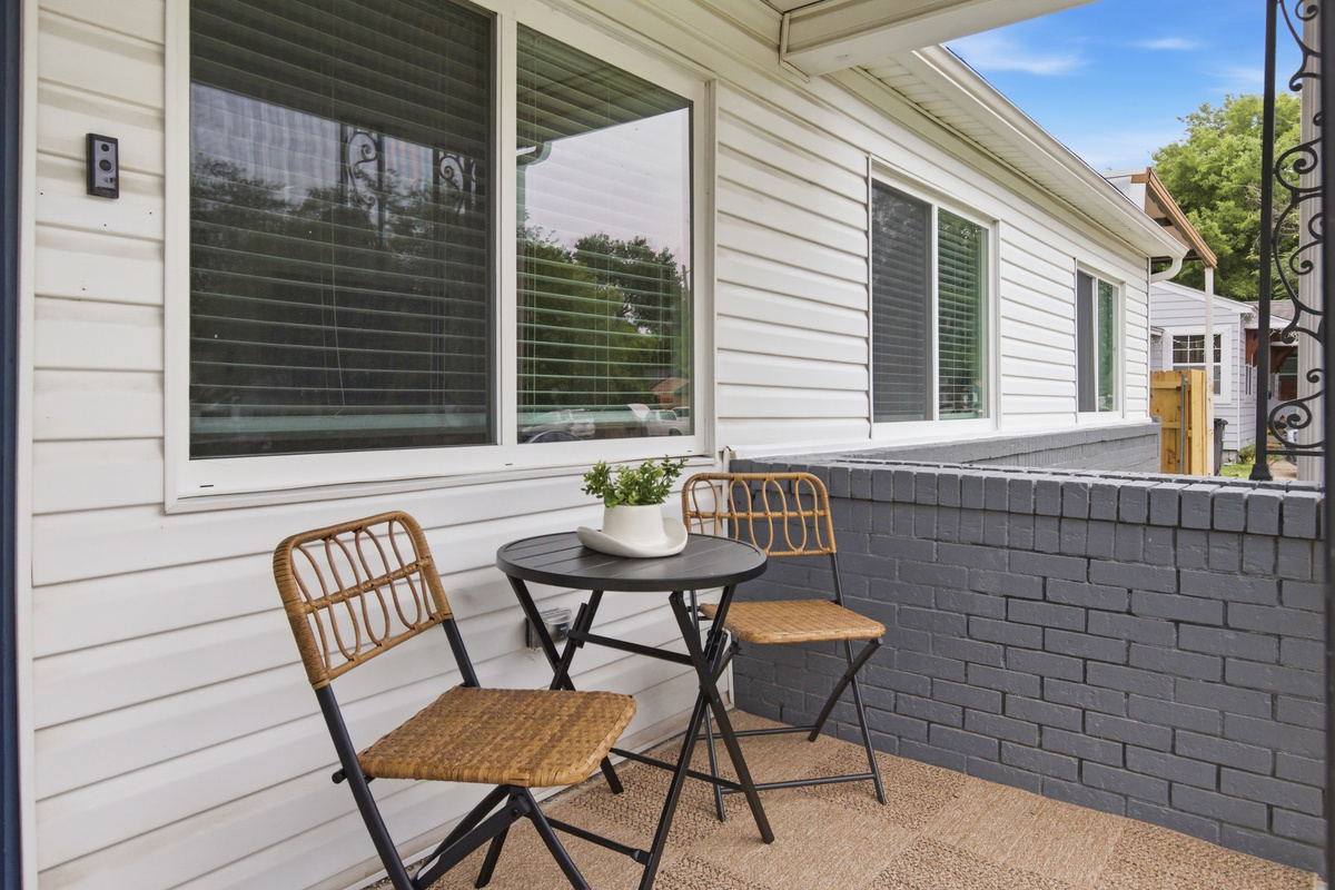 Front Porch with bistro seating, perfect for morning coffee or evening winding down. Quiet Arlington neighborhood, just minutes from Globe Life Field and AT&T Stadium.
