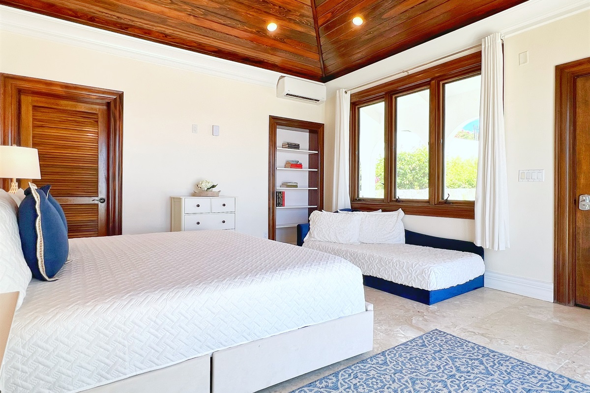 Bedroom 1&rsquo;s balcony offers tranquil ocean views to wake up to.