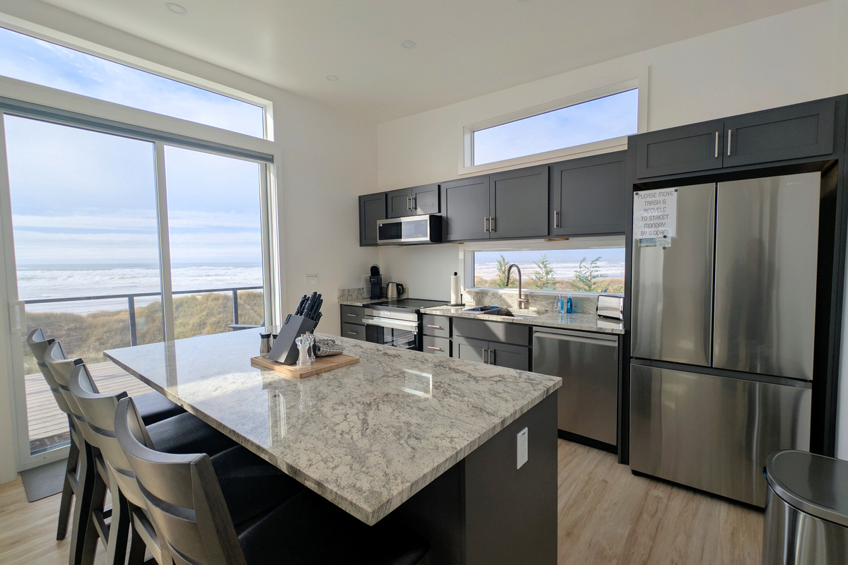 center island with seating for 3 and a view
