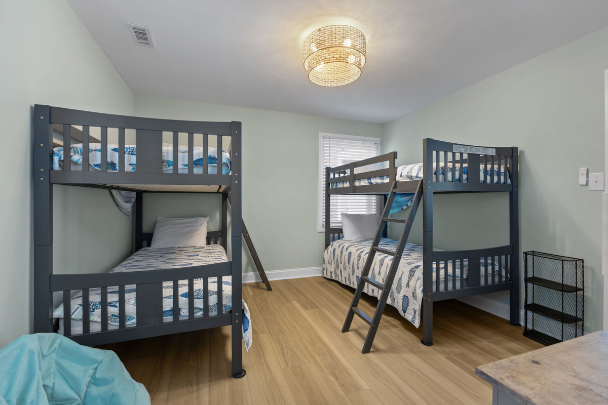 Perfect for kids or larger groups, the bunk room comfortably sleeps up to four guests with two sturdy twin-over-twin bunk beds