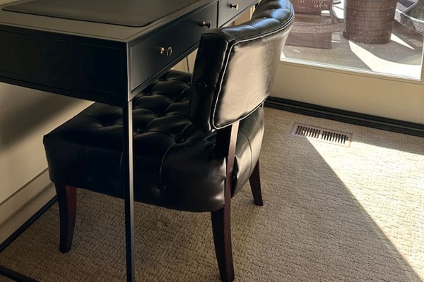 Work-friendly area with picturesque lake views. On-site printer available for guest use.