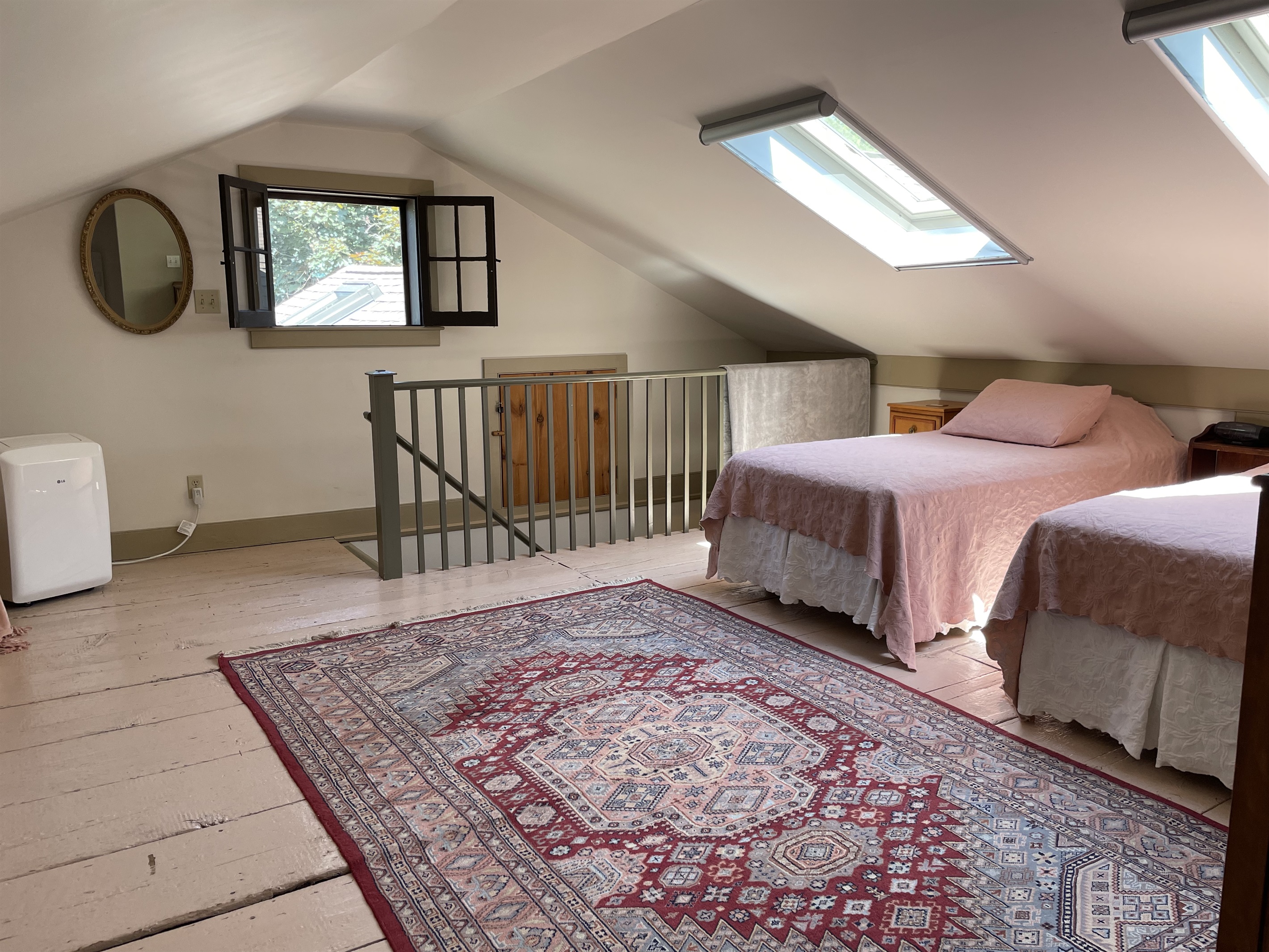 2 Twin beds and a queen bed in sleeping loft.