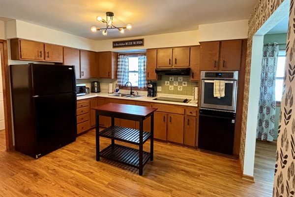 Kitchen: Fully stocked utensils and cookware. Microwave, drip coffee maker, air fryer, oven, stove, dishwasher, microwave