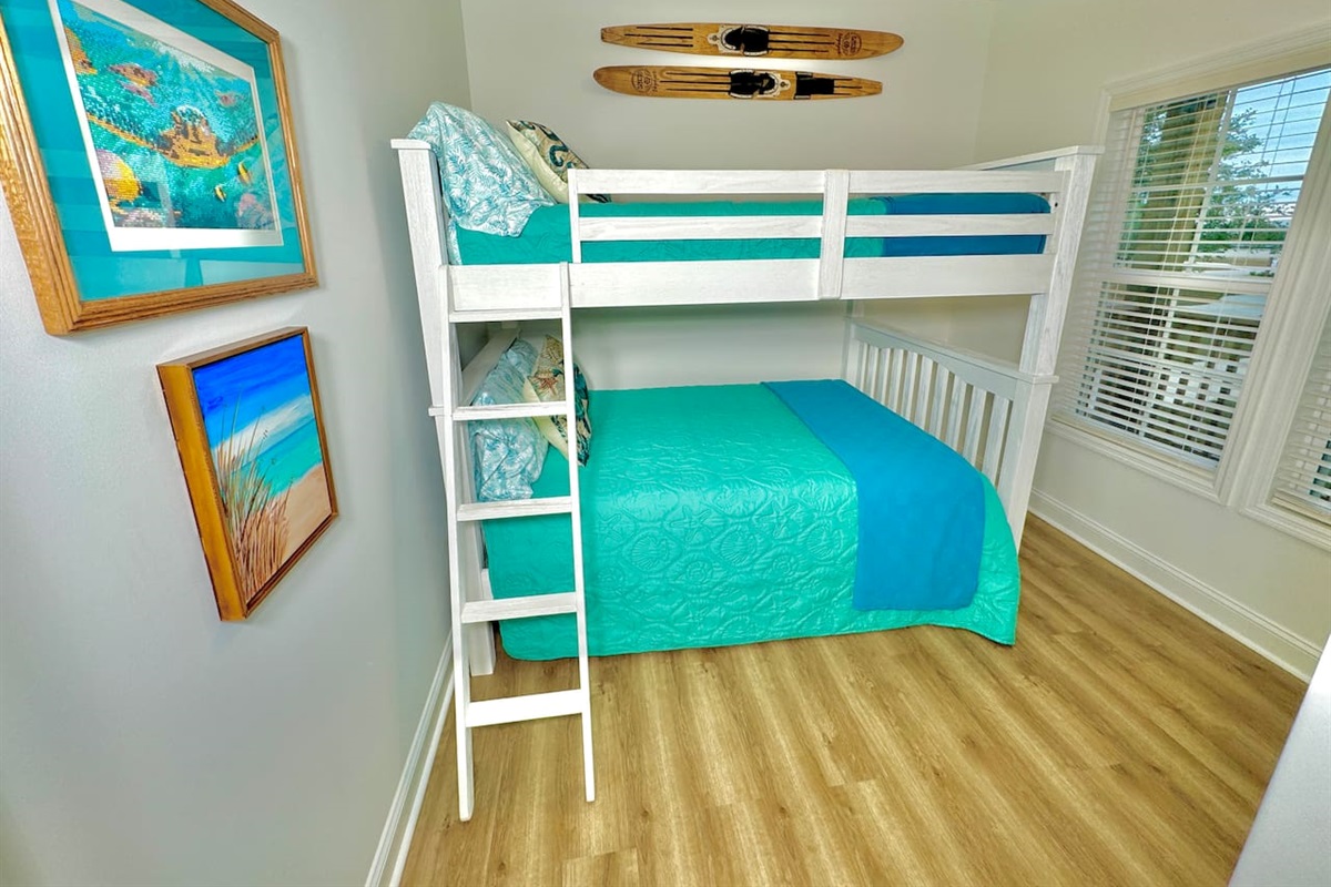 Full-size bunk bed and blackout curtains. 