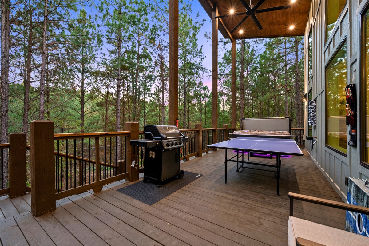 The deck has everything you need to stay entertained—grill up a feast, challenge friends to ping pong, or just kick back and unwind.