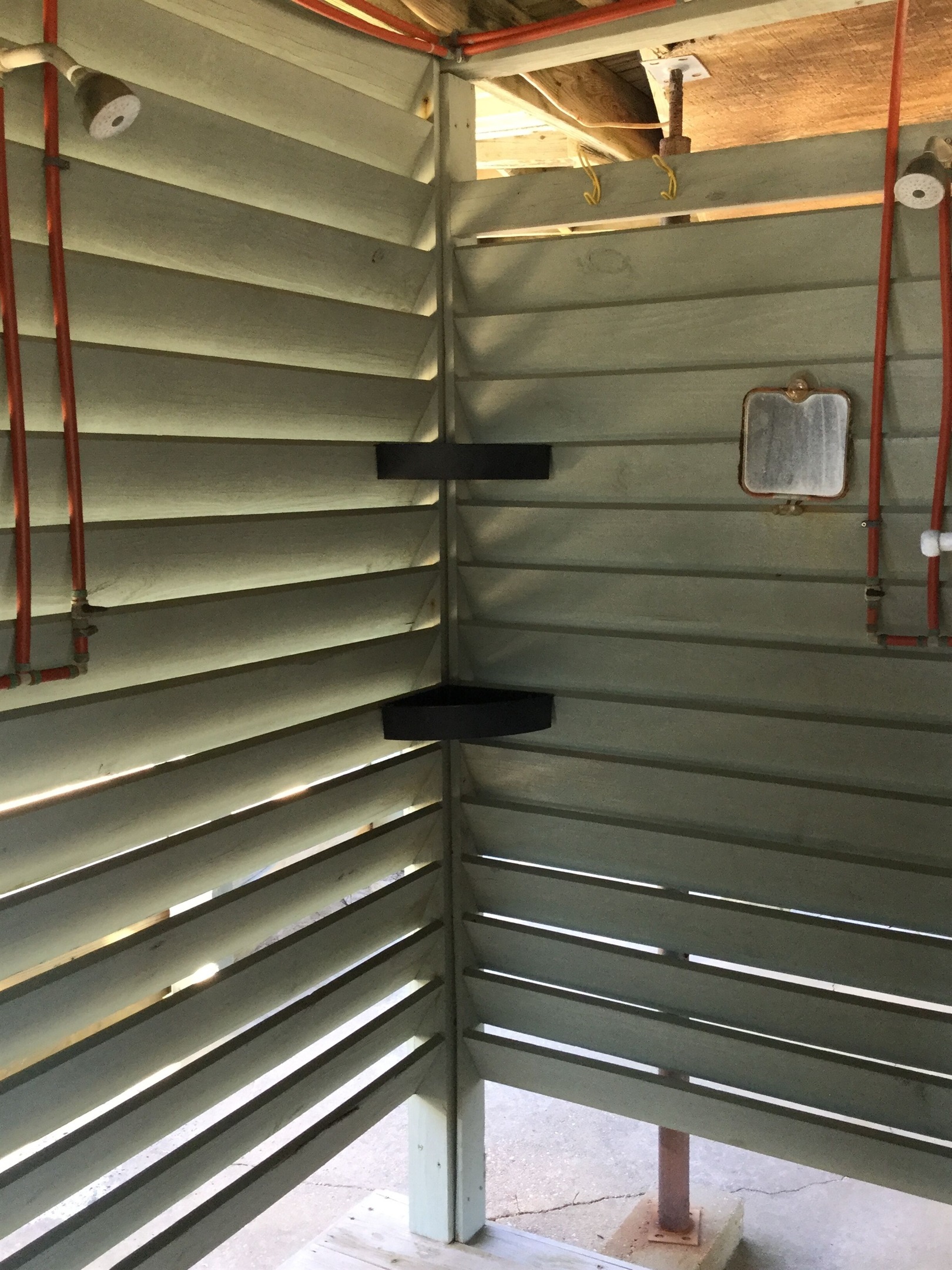 Dual heads in the outdoor hot and cold shower.
