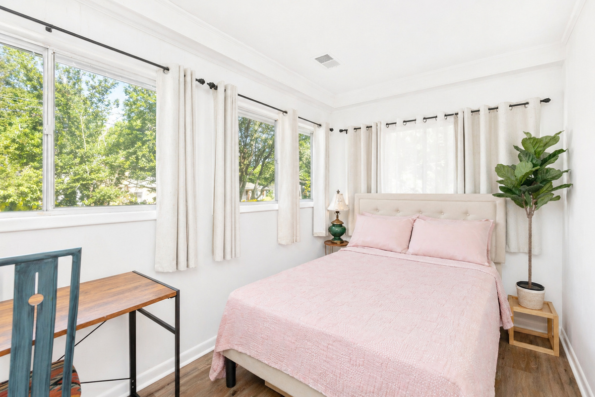 Full sized bed in second bedroom. Desk space for working from home. 

Note this bedroom is accessed both from the outside as well as through first bedroom.