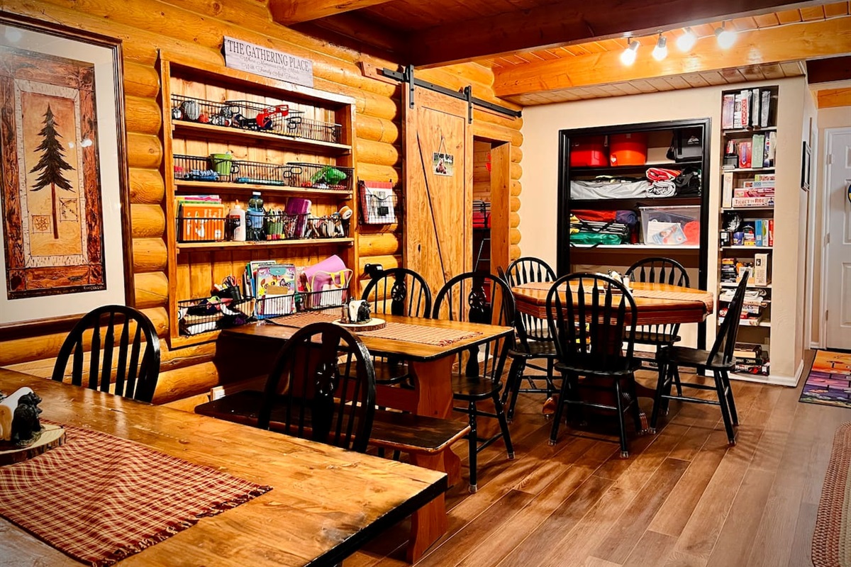 Eating area, board games, beach equipment, crafts and rhythm instruments abound in "The Gathering Place."