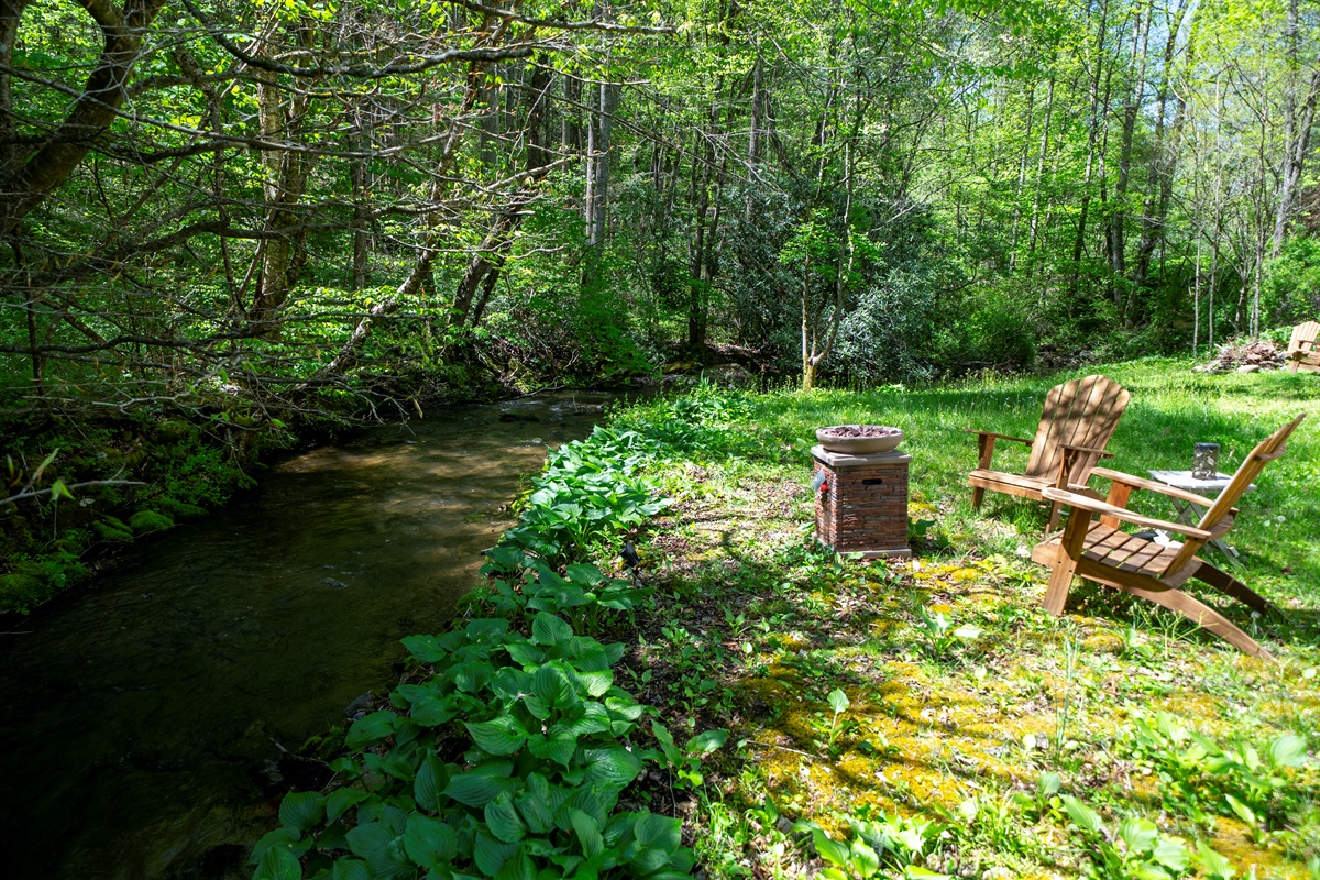 Enjoy effortless evenings by the creek with a convenient propane fire pit- just turn it on and relax.