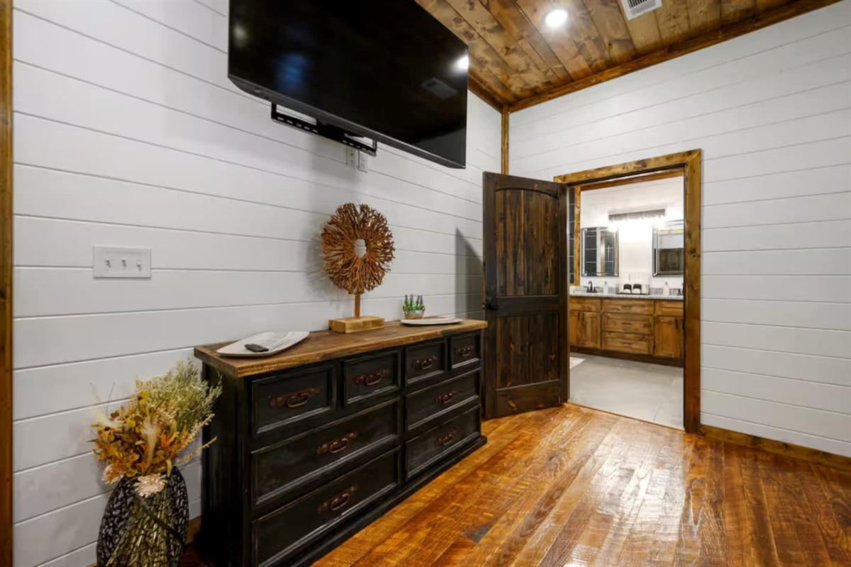  Cozy up for a movie night, then unwind in the connected bathroom just beyond.