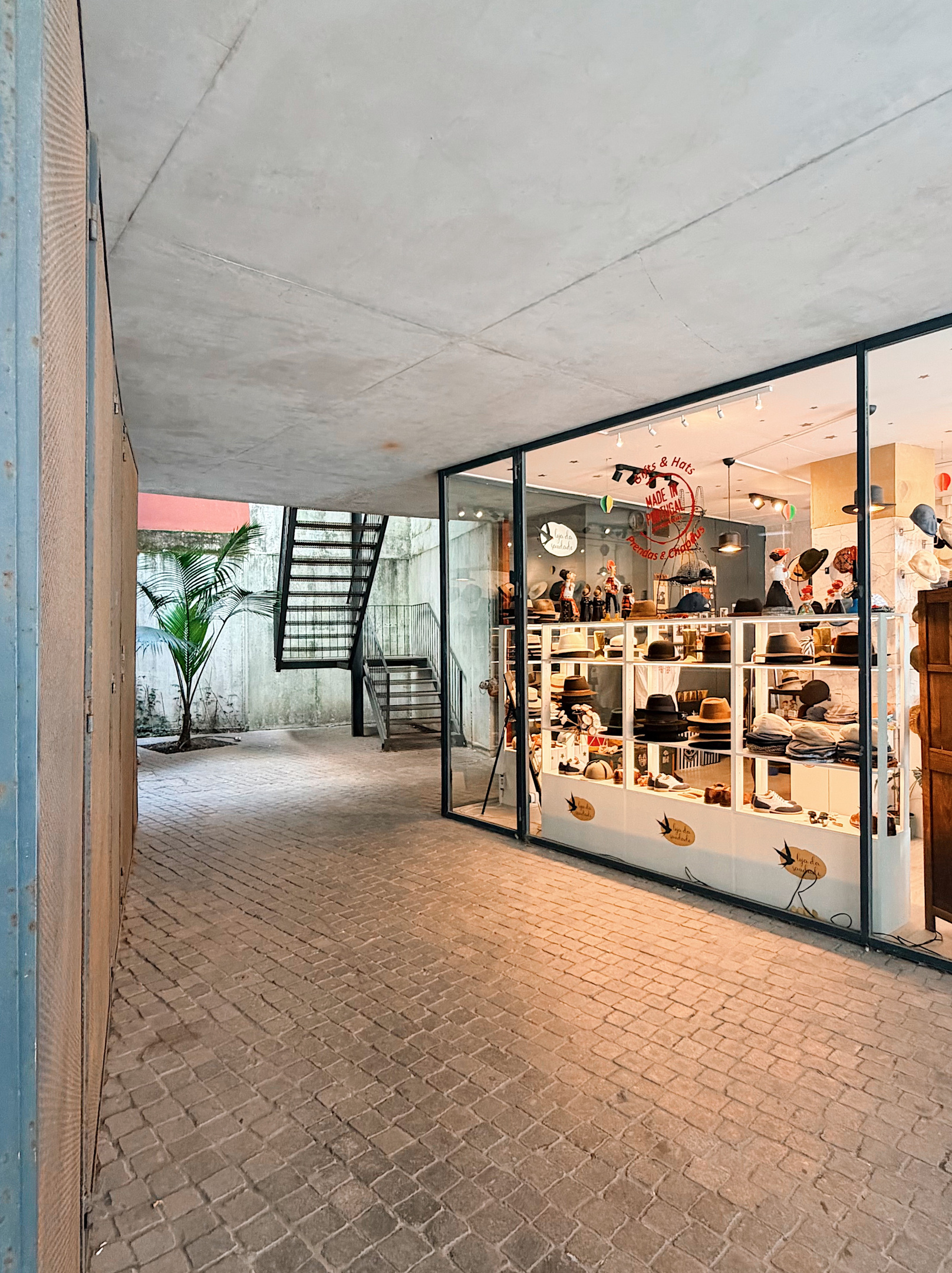 Entry atrium with hat shop downstairs.