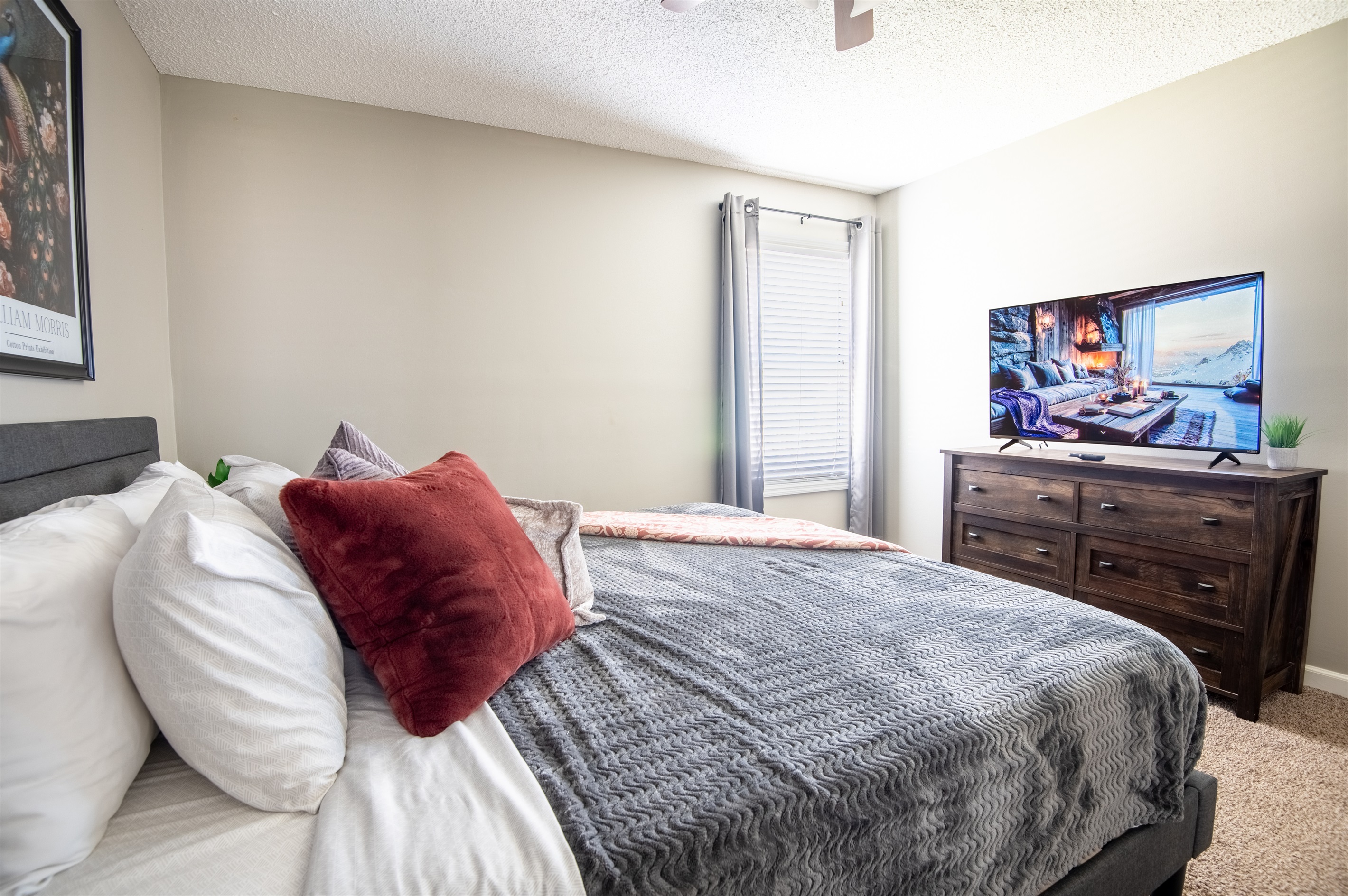 Enjoy all your favorite TV shows and movies on the big smart TV in the king bedroom of Unit C as you unwind from the day.