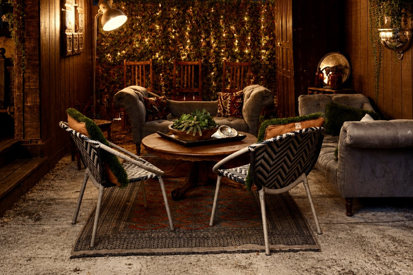 After dark, the Speakeasy reveals its sultry side—a covered lounge made for cocktails, conversation and late-night lingering. Hosting an *approved* event? The leafy back wall is actually a gate that opens to welcome a food truck into the courtyard.