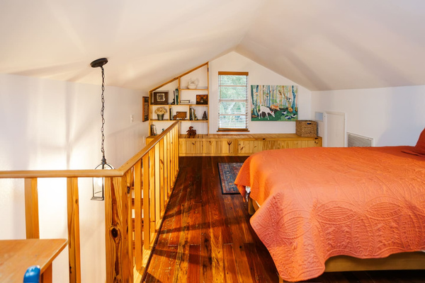 Cozy area tucked into the loft - room to spread out and play a game.