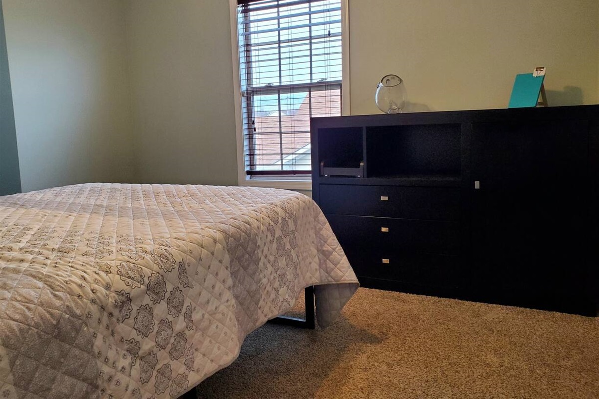 Split floorplan with Master suite on the main level. Tastefully decorated master bedroom with private TV, Roku for all of your streaming pleasures and walk in closet. Master bedroom includes secluded in suite bathroom.