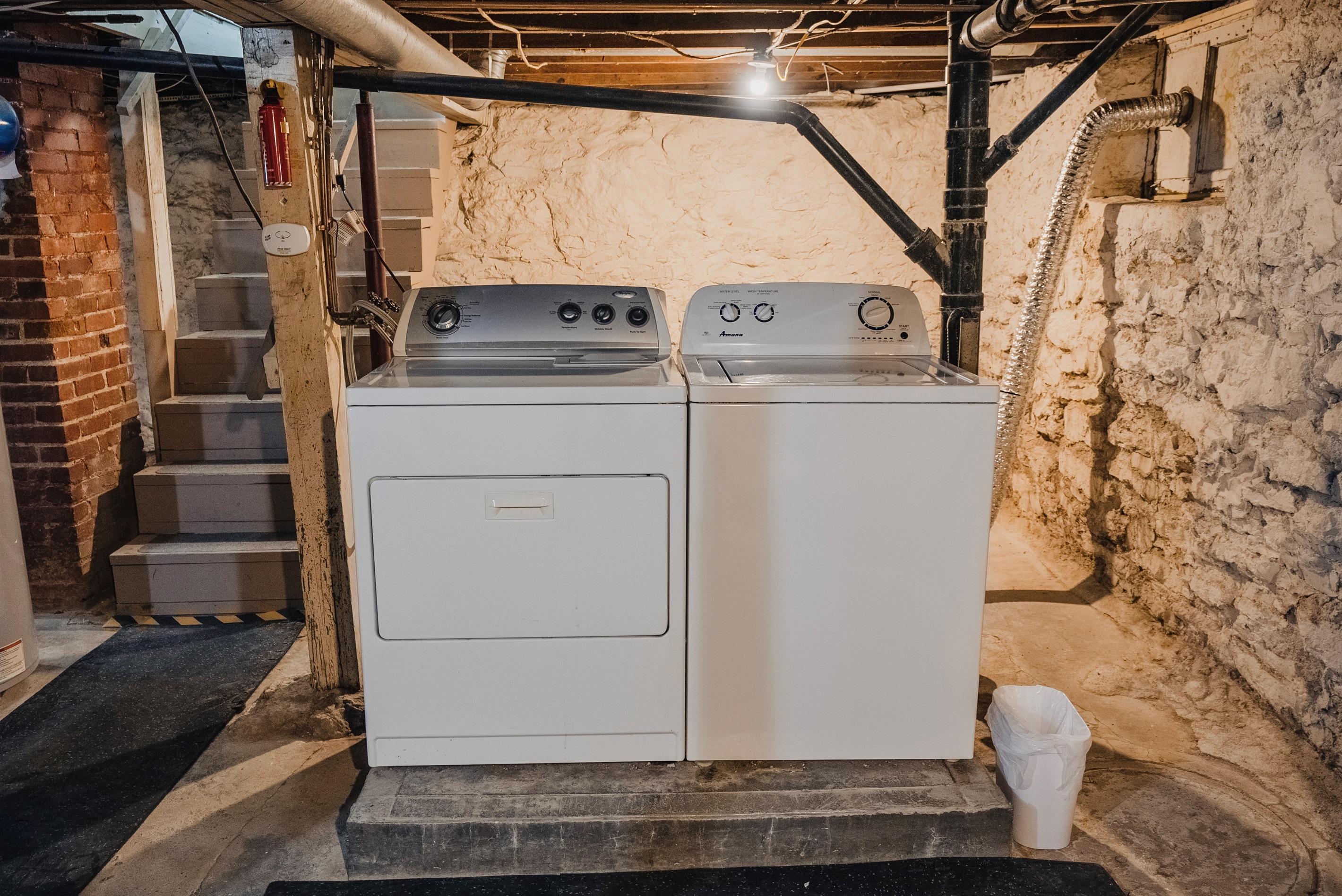 Washer/dryer in basement/shelf and laundry basket