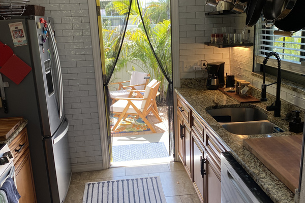 View from the kitchen to the East Patio