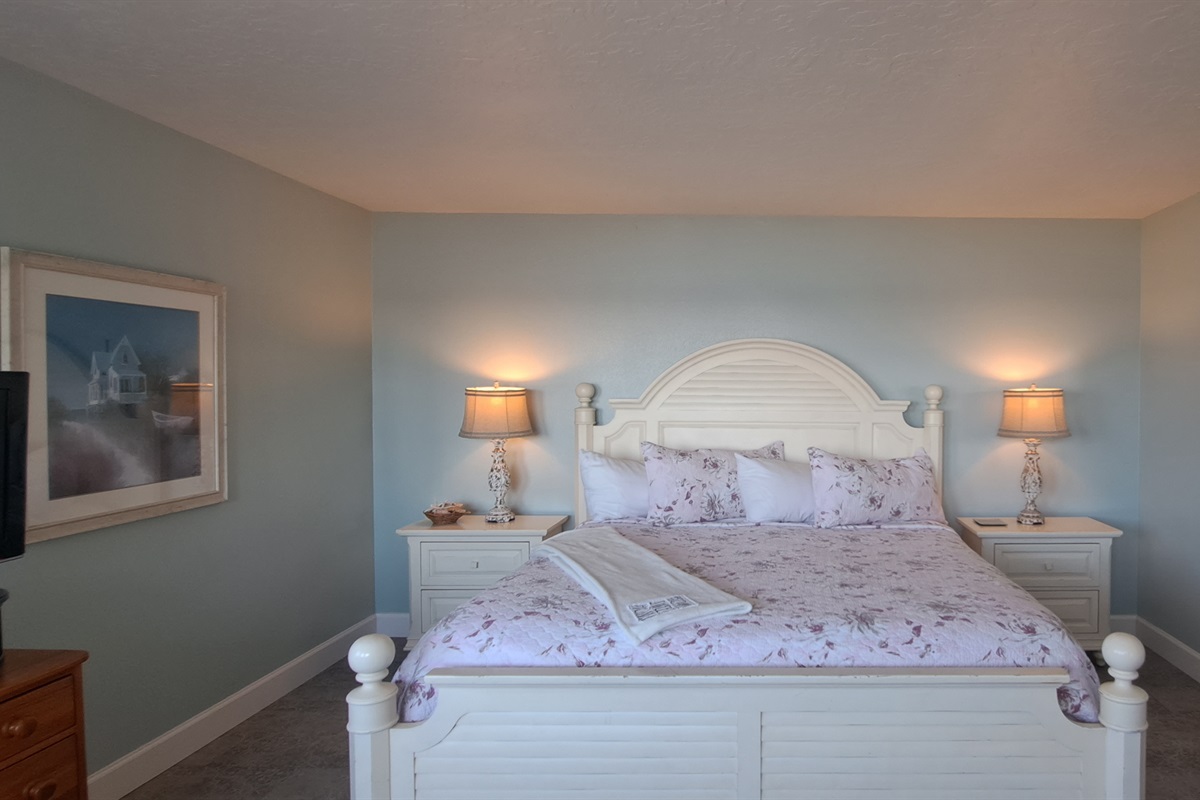 Spacious master suite with a king bed and amazing views.