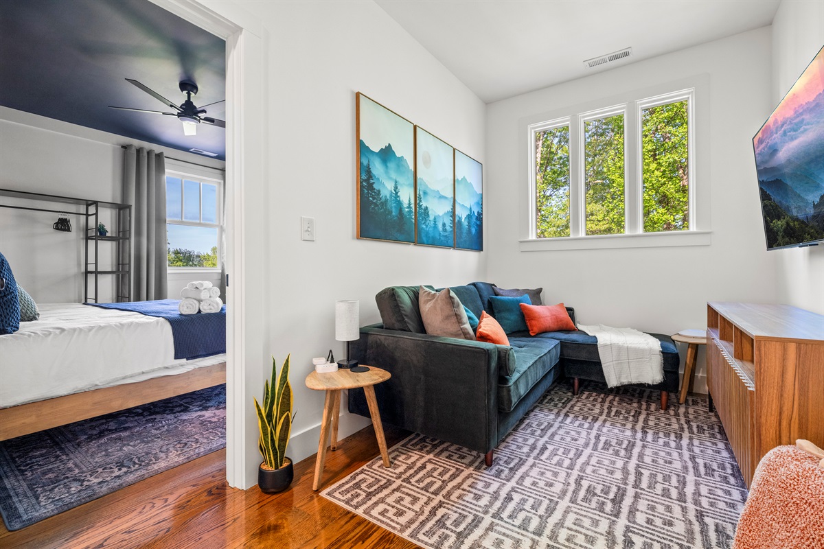 Tucked just off the upstairs hallway, this smart TV nook is a peaceful hideaway—perfect for curling up with a book, streaming a show, or plugging in your gaming console (not provided). Quiet, comfy, and away from the buzz.