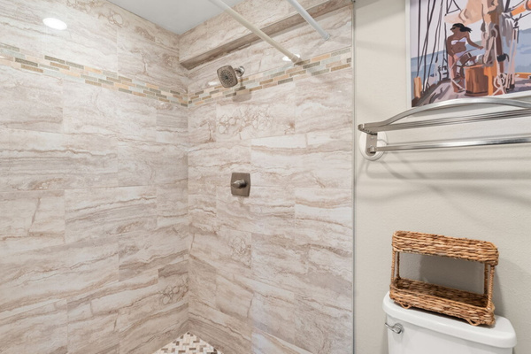 Gorgeous walk-in tiled shower in the master bathroom