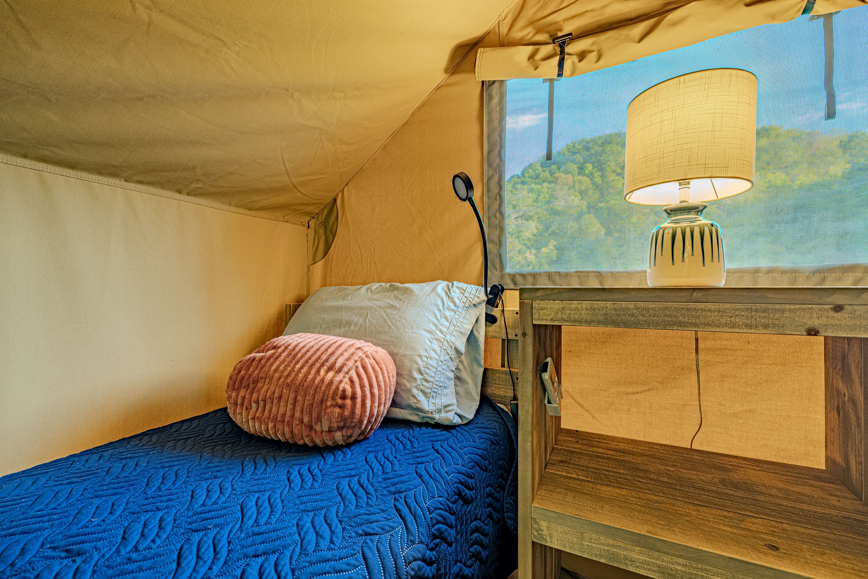 Rest easy after a day of adventure. This cozy, comfortable bed is waiting for you.