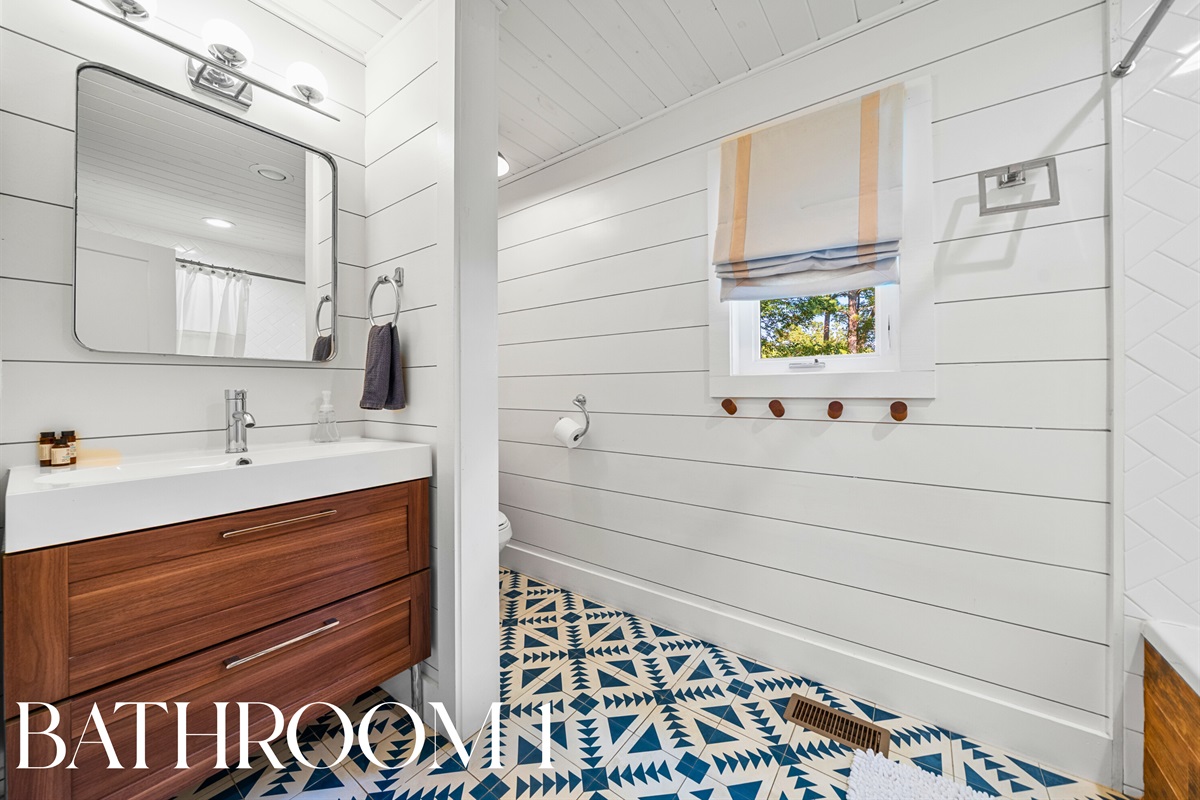 Stylish bathroom with warm wood touches for a spa-like vibe.