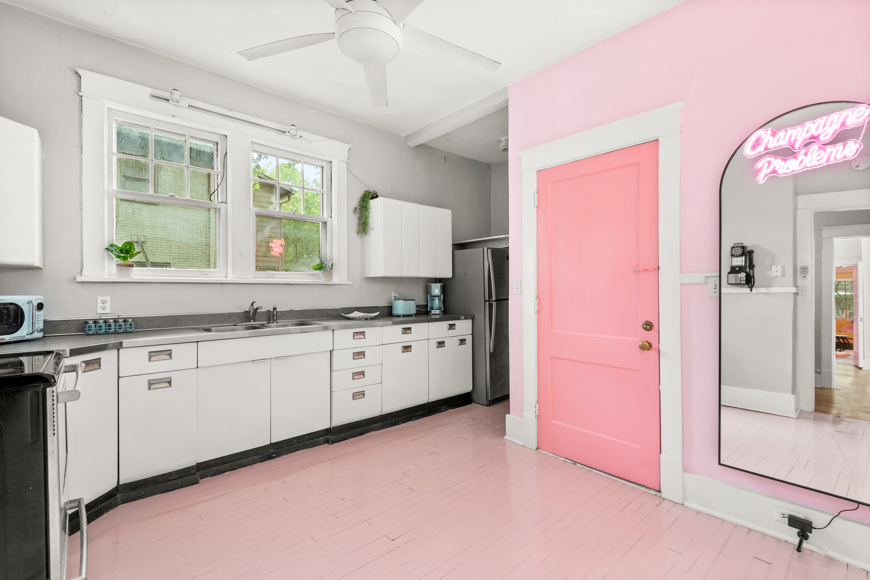 door to back patio and washer and dryer 