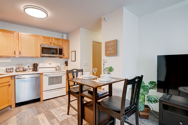 Open and airy layout connecting the dining and living areas, perfect for socializing and relaxing.