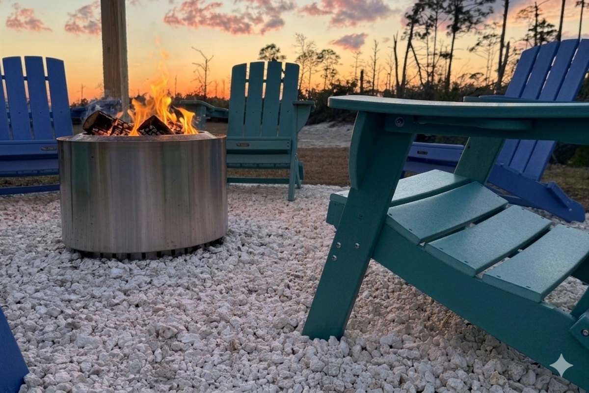 Gas grill (not shown) and smokeless firepit with Adirondack chairs for cozy outdoor hangs.