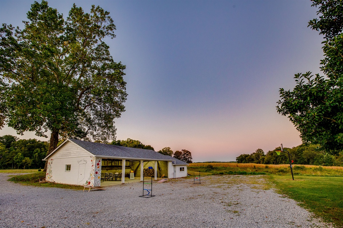 Enjoy the great outdoors with your family, rain or shine!  The game barn (pictured) is stocked with yard games, a grill, patio table and more family fun!