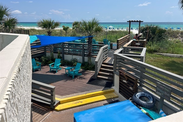 Private beach access w/ shaded seating. Beach chair service included (seasonal)