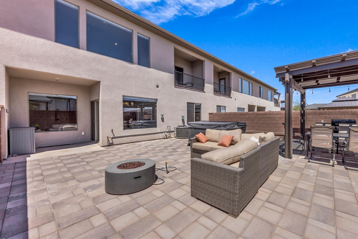 Spacious Paver Courtyard Seamlessly Connected to Home